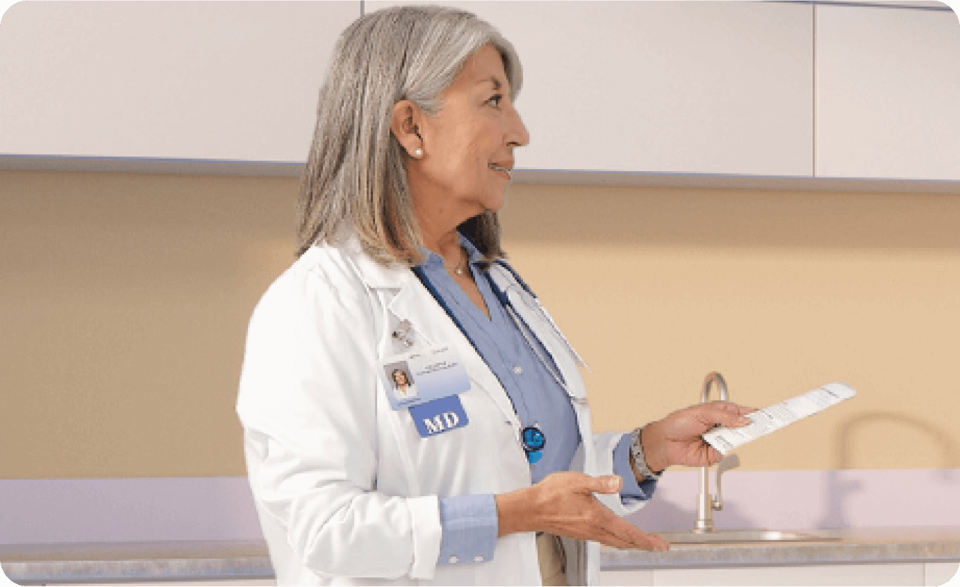 Doctor speaking to patient about their opioid-induced constipation